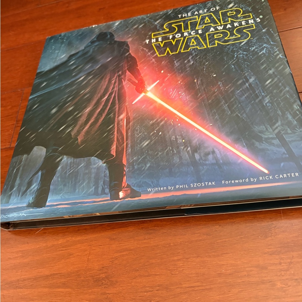 Star Wars Black Hardcover Art Book with Red Lightsaber Accent